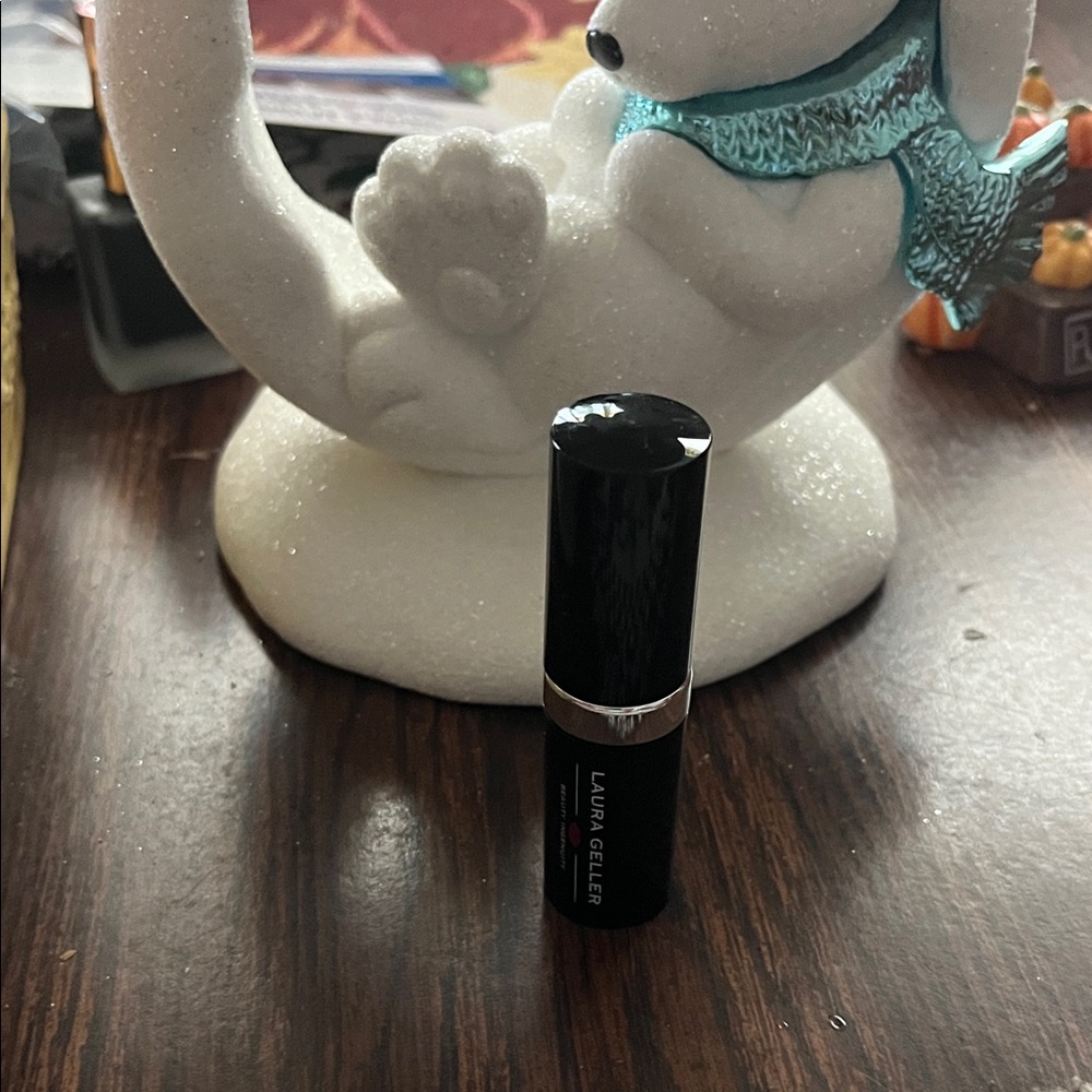Laura Geller Sleek Black Lipstick in Rosato the shade